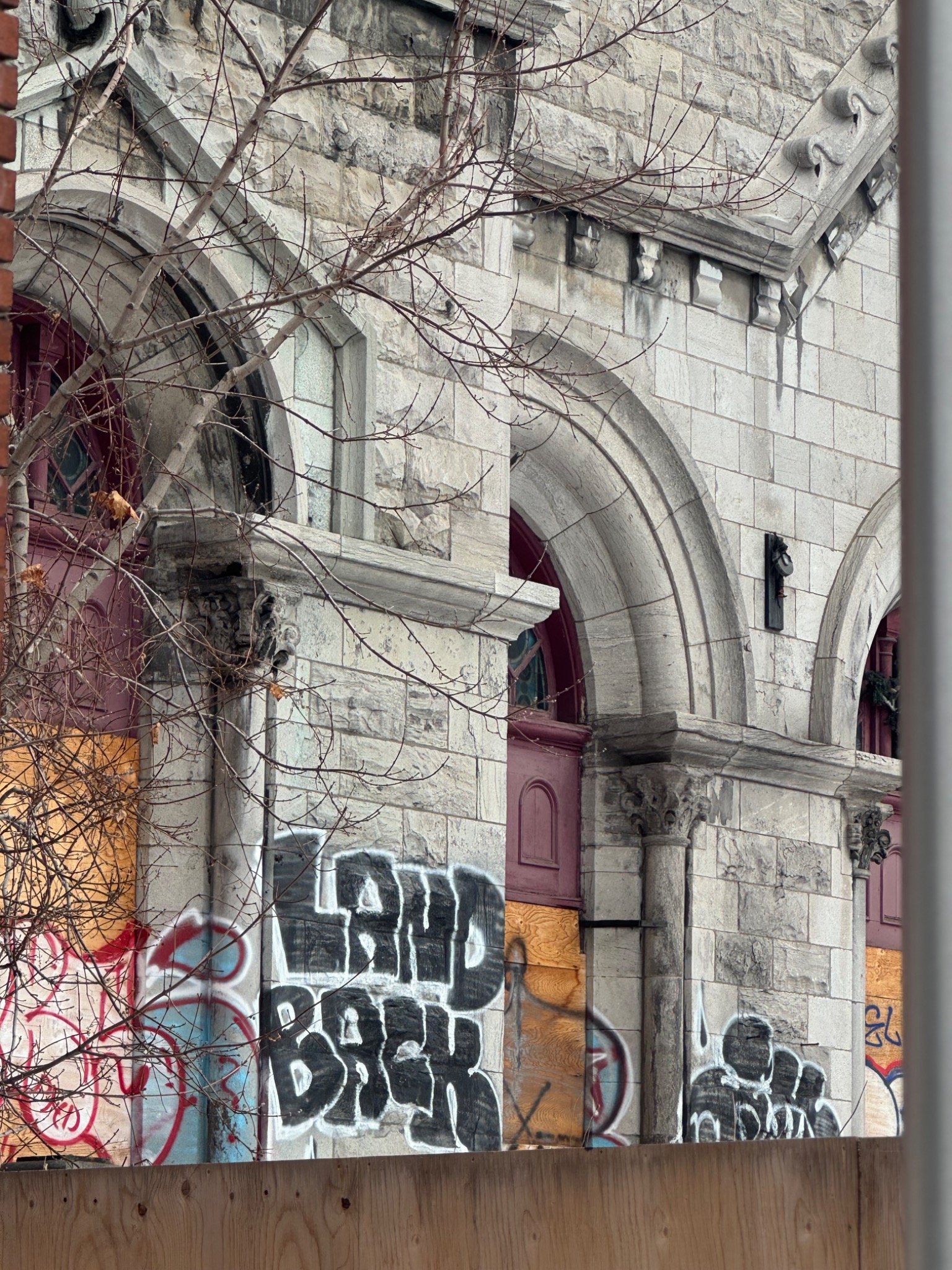 Rue Fullum church, fenced frontage, Montreal, Quebec. Photograph by Richard Wainwright.
