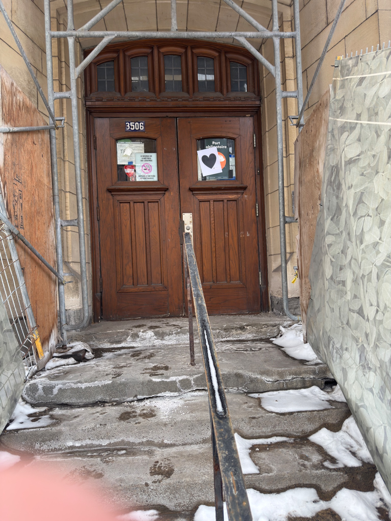 Wilson Hall façade and construction barrier, McGill University, Montreal, Quebec. Photograph by Richard Wainwright.
